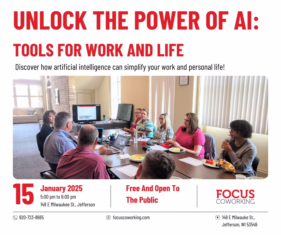 Photo of people at a conference room table learning about Artificial Intelligence Tools